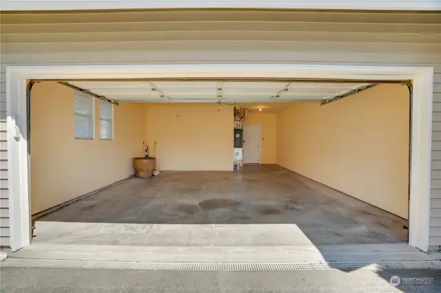 Drive straight into the attached 2-car garage from the paved driveway. Windows provide light and fresh air, and you'll find the water heater and 2023 furnace near the back door.