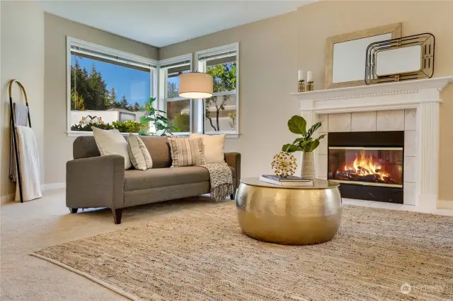 West and south facing windows bring natural light into the fireside living room long into the evening.