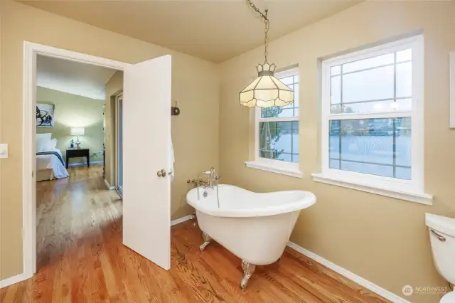 Primary bathroom and claw foot tub.