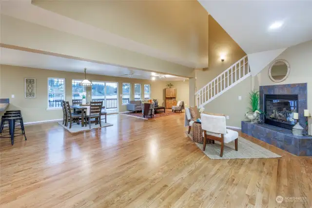 Spacious, open concept front room with full, relaxing view of the lake.