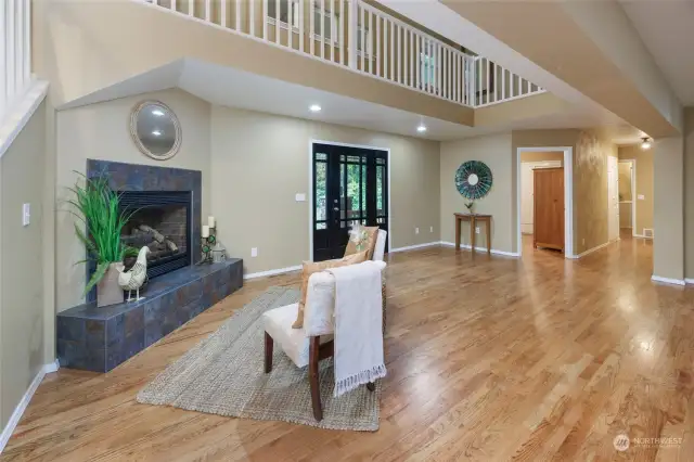 Fireplace is near the front door for immediate relaxation when you enter the home.