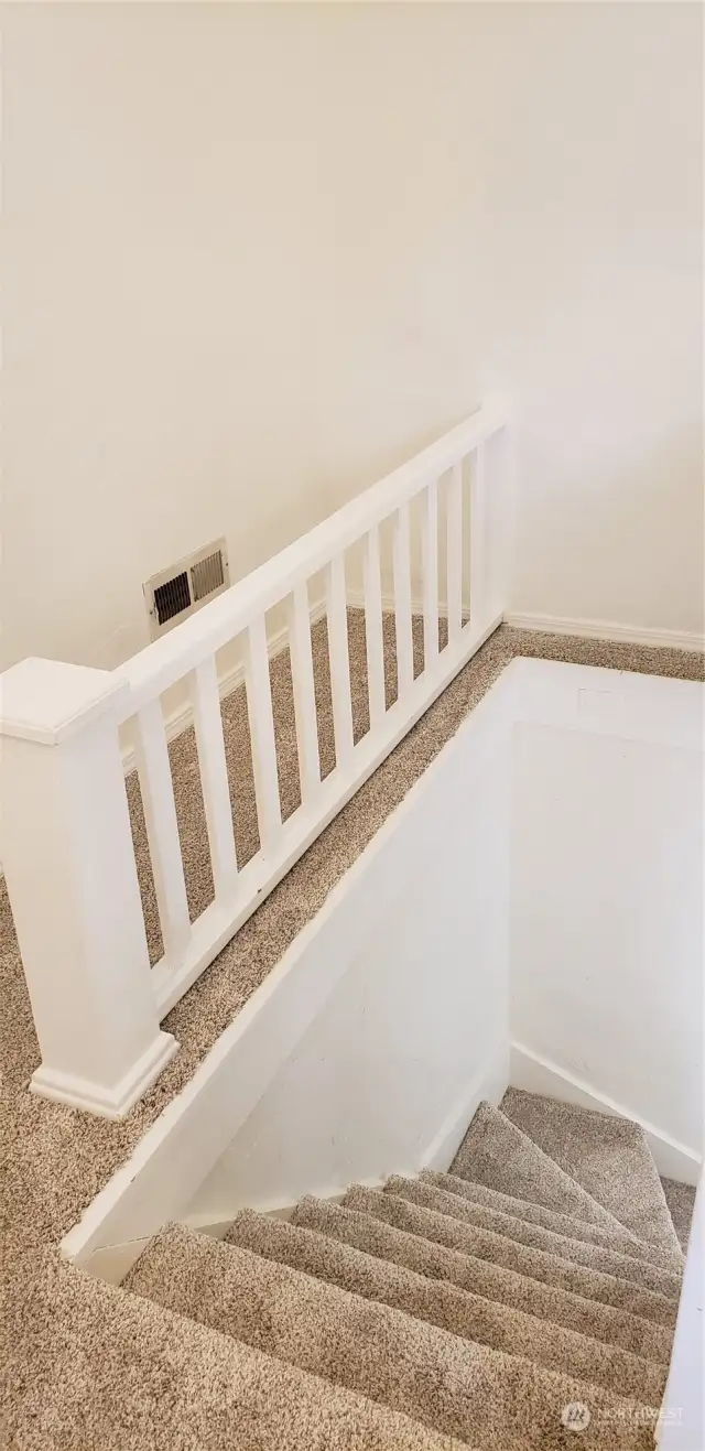 Stairs to 1st floor of upper unit