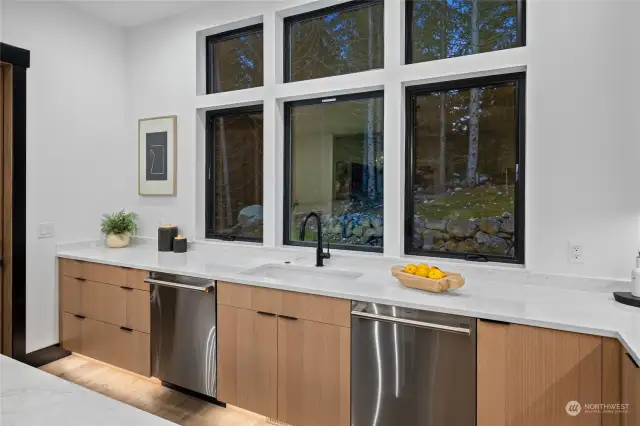 Dual dishwasher setup next to kitchen sink