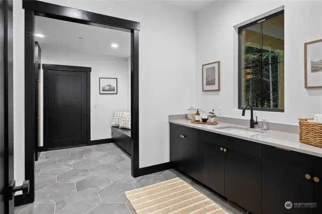 Mudroom/Utility Room off three car garage