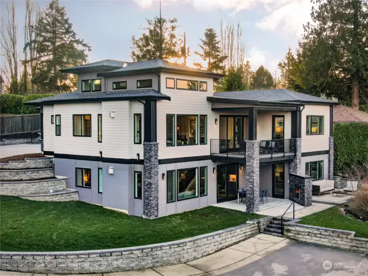 Hardy Siding, Stacked Stone Details, 50 year Presidential Shingles, Irrigation System, Outdoor Patio Speakers in the Back, Gutter System Attached to Short Plat Storm Drainage System, Clear Cedar Soffits, etc.