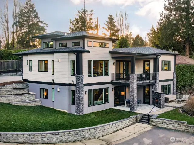 Hardy Siding, Stacked Stone Details, 50 year Presidential Shingles, Irrigation System, Outdoor Patio Speakers in the Back, Gutter System Attached to Short Plat Storm Drainage System, Clear Cedar Soffits, etc.