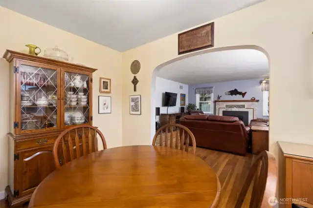 Dining room with arched entry to living room