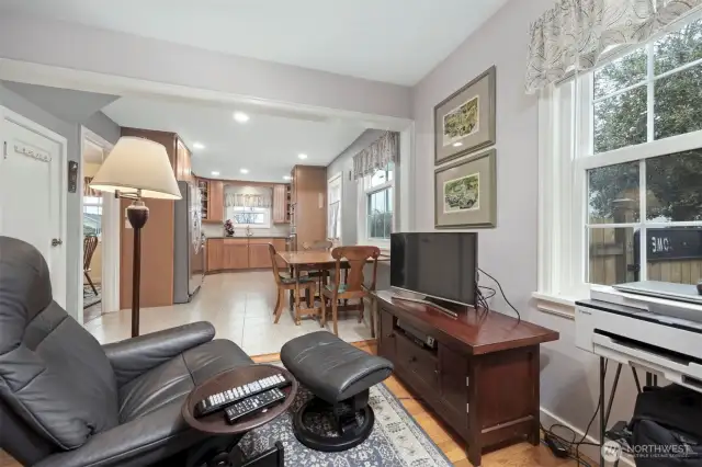 Den and adjacent kitchen