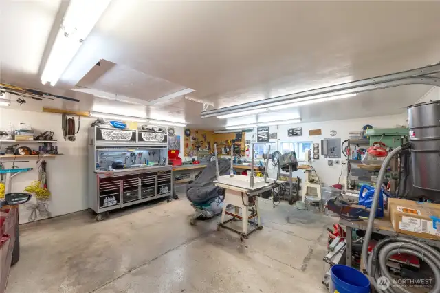 Insulated two-car garage with extra shop area