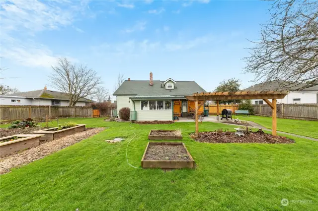 Arbor and raised garden beds