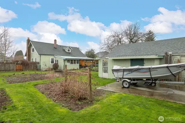 Large flat yard with greenhouse