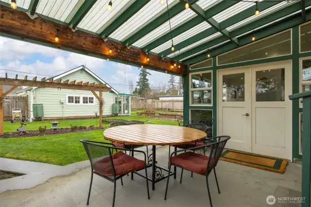 Covered patio overlooking the yard