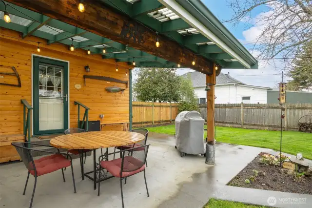 Decorative wood siding under covered patio