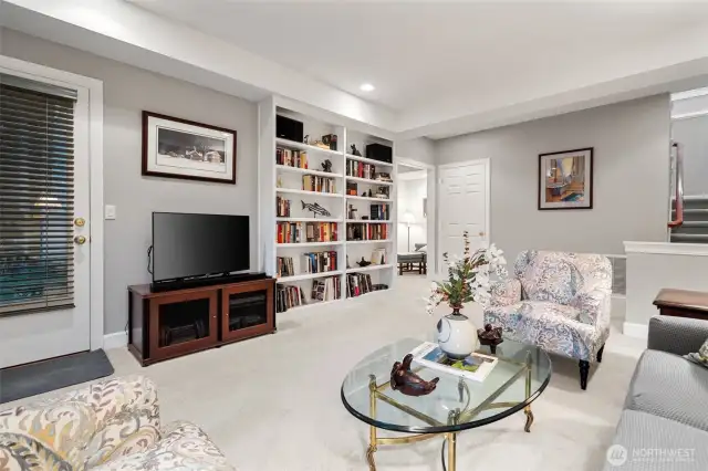 Lower level family room with access to the back yard and patio.