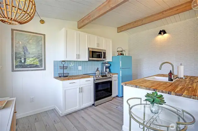 Open + flowing floor-plan. NEW SS appliances.....FULLY appointed, all furnishings go with the sale. Nothing to do but move in and love living the island lifestyle.