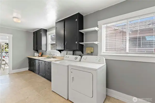 Big windows fill the kitchen with plenty of natural light