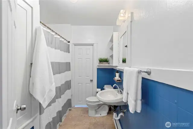 The full bath is located next to the main bedroom, guest bedroom & bonus room.