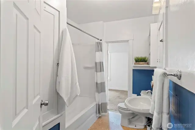 The full bath leads to bonus room. The guest bedroom is to the right of that.