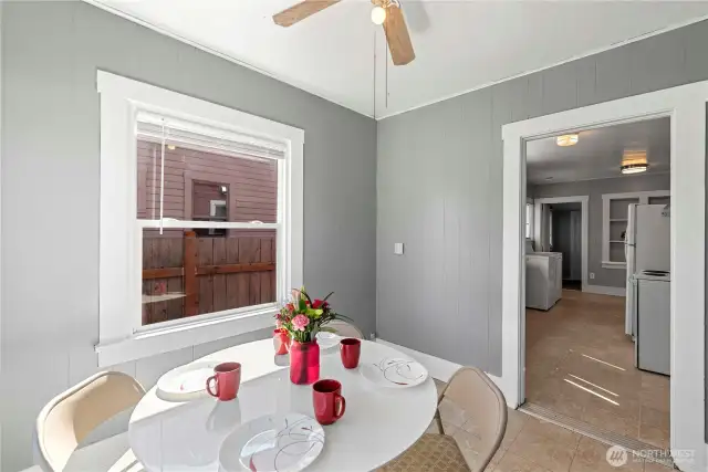 The dining room is conveniently located next to the kitchen