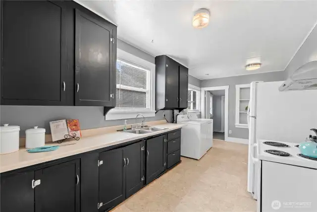 The kitchen has lots of counterspace and storage