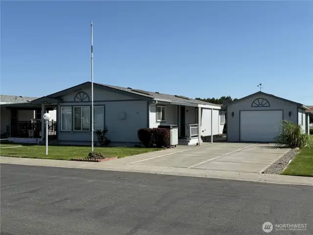 Three bedroom 2 bath home with a garage in a premiere 55+ community.