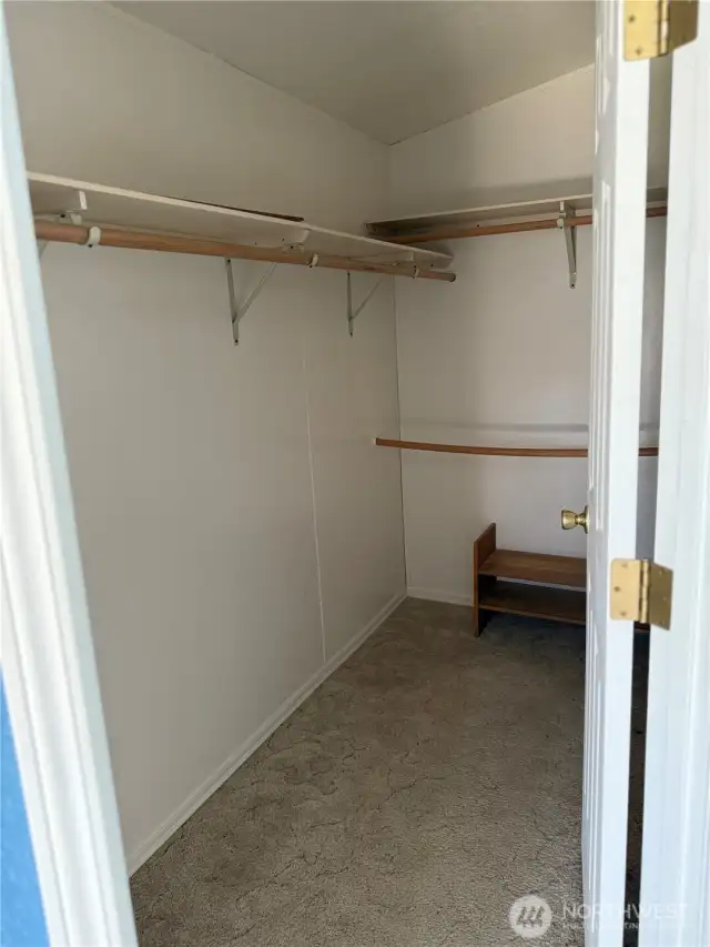 Primary walk in closet.