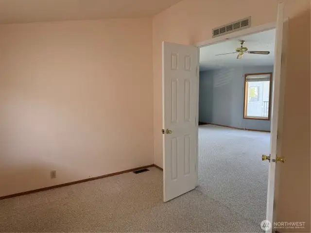 Second bedroom looking to living room.