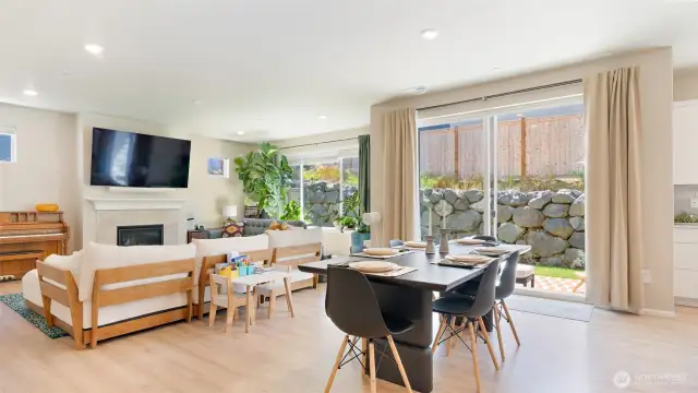 The living and dining rooms connect seamlesslessly which, in turn, give access to the private back yard through a huge sliding glass door. The yard's lush grass and large aggregate patio invite you to spend time outside!