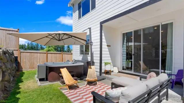 This backyard oasis offers incredible privacy and a retreat-like setting.