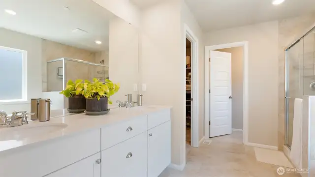 The counter space between the two sinks is fantastic. Of course, there's a separate water closet, and just wait until you see the walk-in closet!