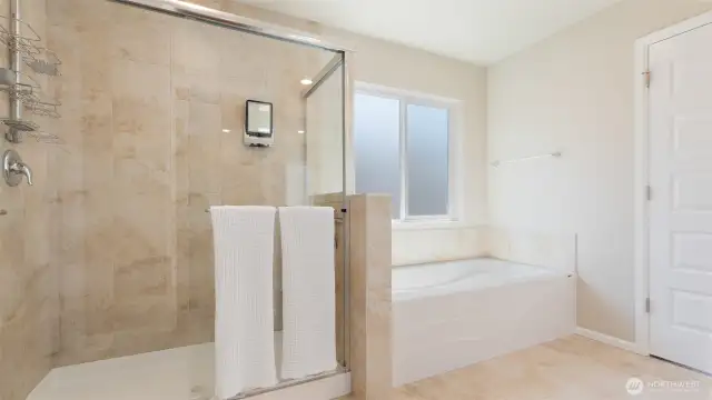 This photo disguises the fact that that's actually a 6-foot soaking tub! You'll have plenty of room to stretch out and submerge... and yes, the whole bathroom feels larger than this photo suggests, too.