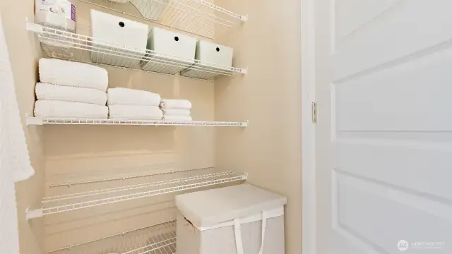 More than just a little bit of shelving in this main hall bath... you'll love all of this storage space!  :)