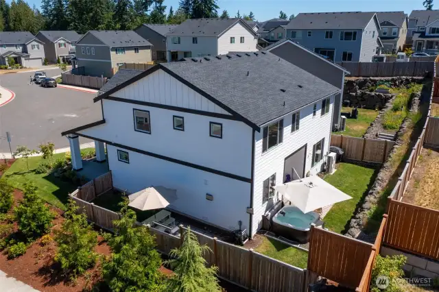 What a standout home, nearly new, with added features that make it even better than new construction!