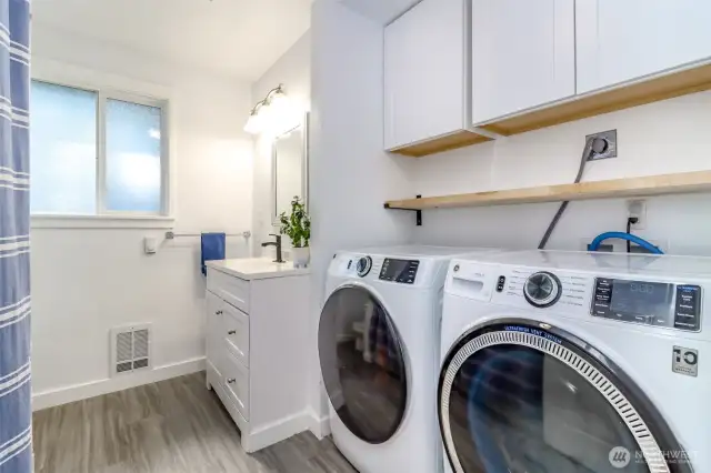 Main full bath and laundry.