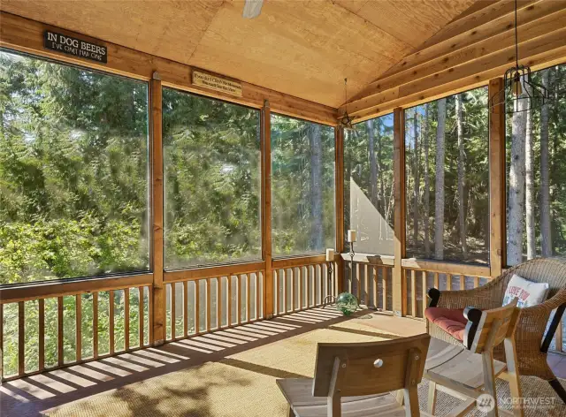 A side door off the great room leads to a screened porch, perfect for year-round entertaining.