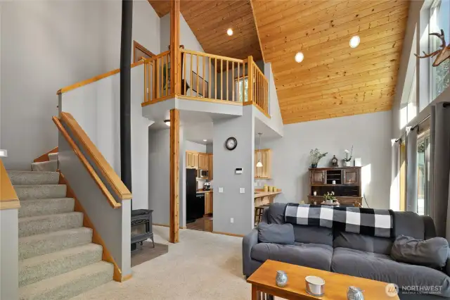 Stairs leading to the loft and primary bedroom.