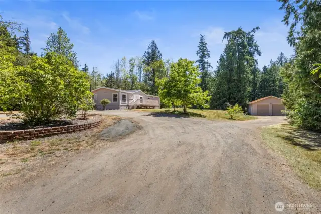 Great affordable and move in ready home with huge shop on 2.5 acres!