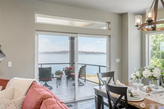 Effortlessly flow from cozy indoor living to a stunning waterfront deck built for serene mornings.