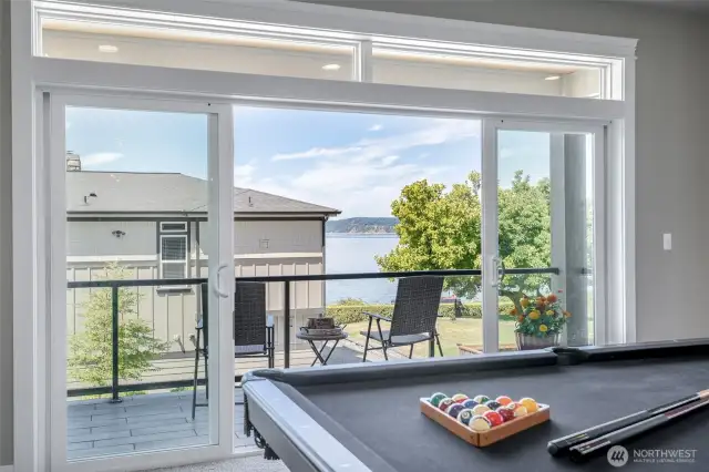 Unwind with Puget Sound views and coastal breezes from your own entertainment retreat and private balcony.