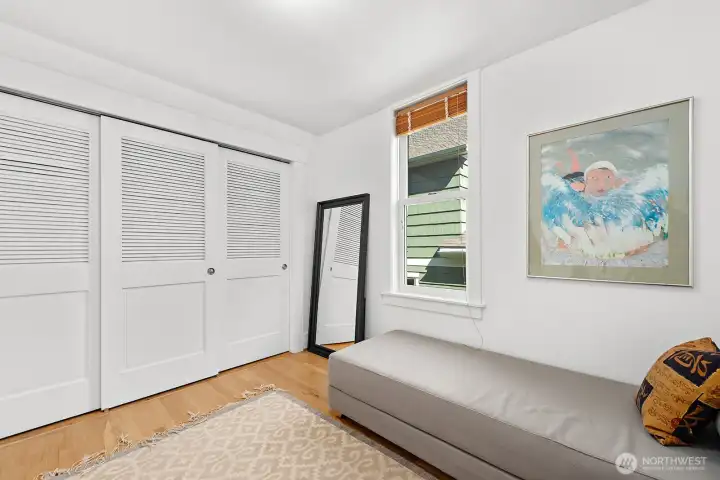 This 3rd bedroom features a wall of closet space for all of your additional wardrobe or storage needs.