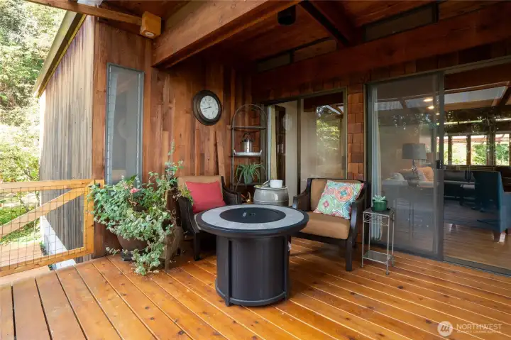 Back deck with partial cover right outside your living room