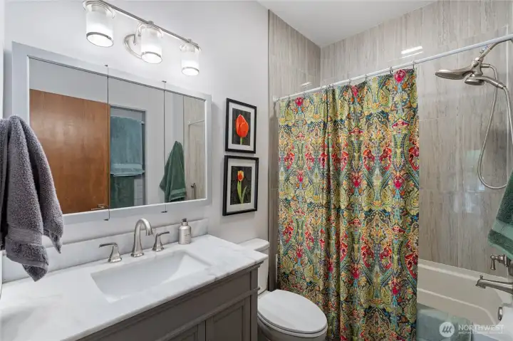 Main bath with tub and shower