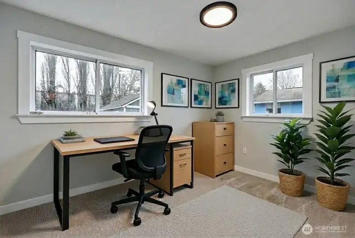Bedroom on main would make a great office. Digitally staged.