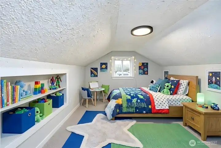 Loft style bedroom #4 (there are 2 on 2nd floor) digitally staged.