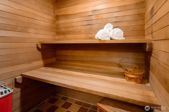 Steps from the Garden Level bathroom a well-kept cedar sauna adds comfort and convenience to daily routines.