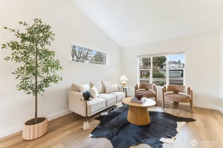 Soaring ceilings create an airy, dramatic living space.