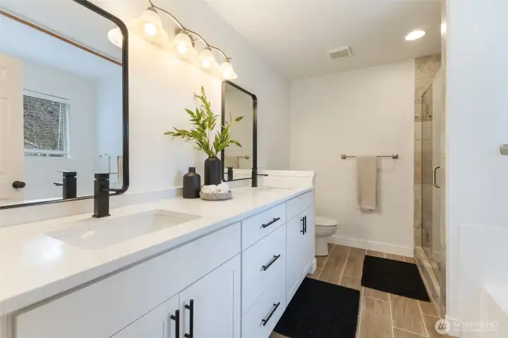 Five-piece ensuite bath adds spa-like comfort.