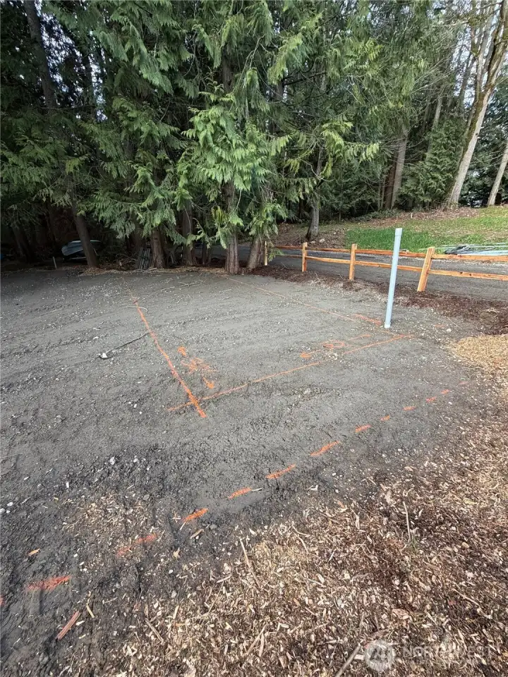 Shop site with electrical conduit and water