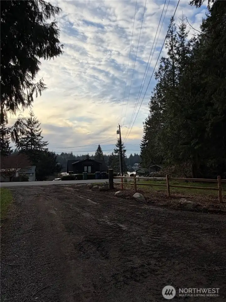 Looking South toward lake. Photo taken from access easement on neighboring lot