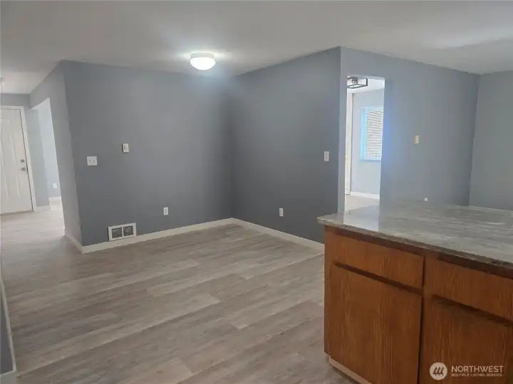 Nook adjacent to the kitchen. Use for dining, home office or ?